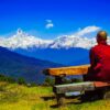 Monk looking at Fishtail Peak of Annapurna Mountain